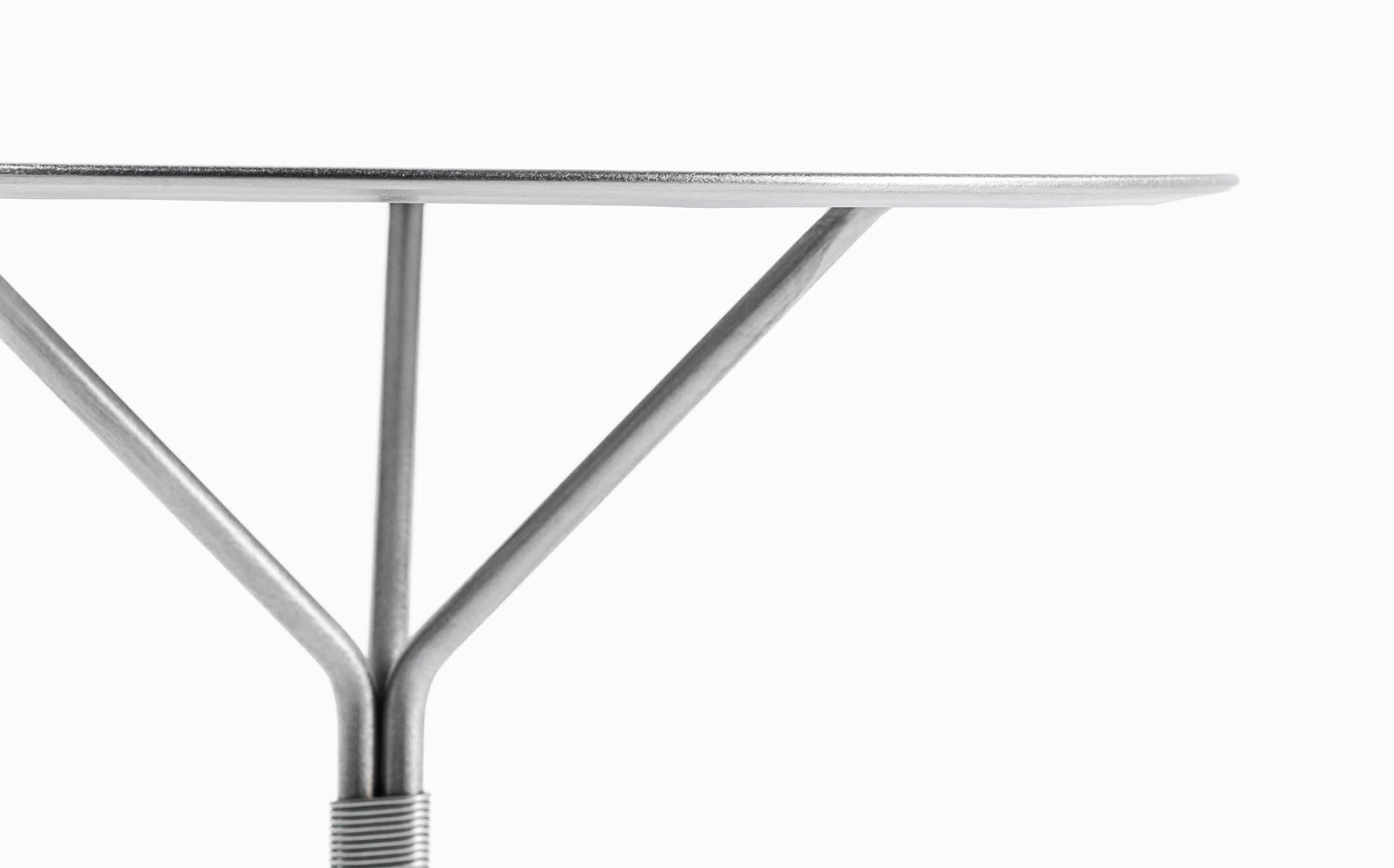 serpentine table - stainless
